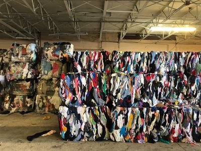 Sorted clothing bale stacks